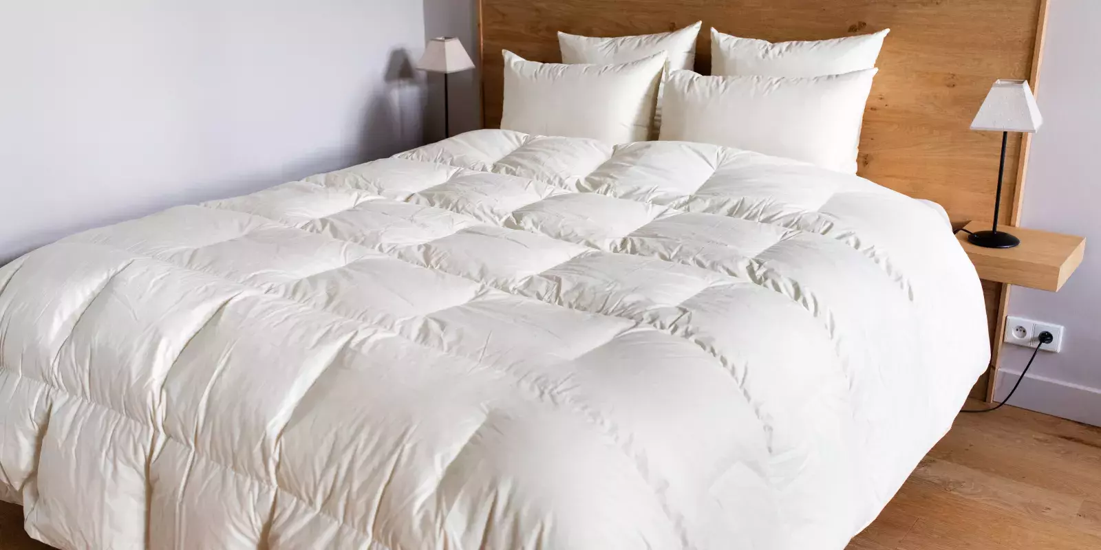 Fabrication artisanale de couettes et oreillers en plumes et duvet